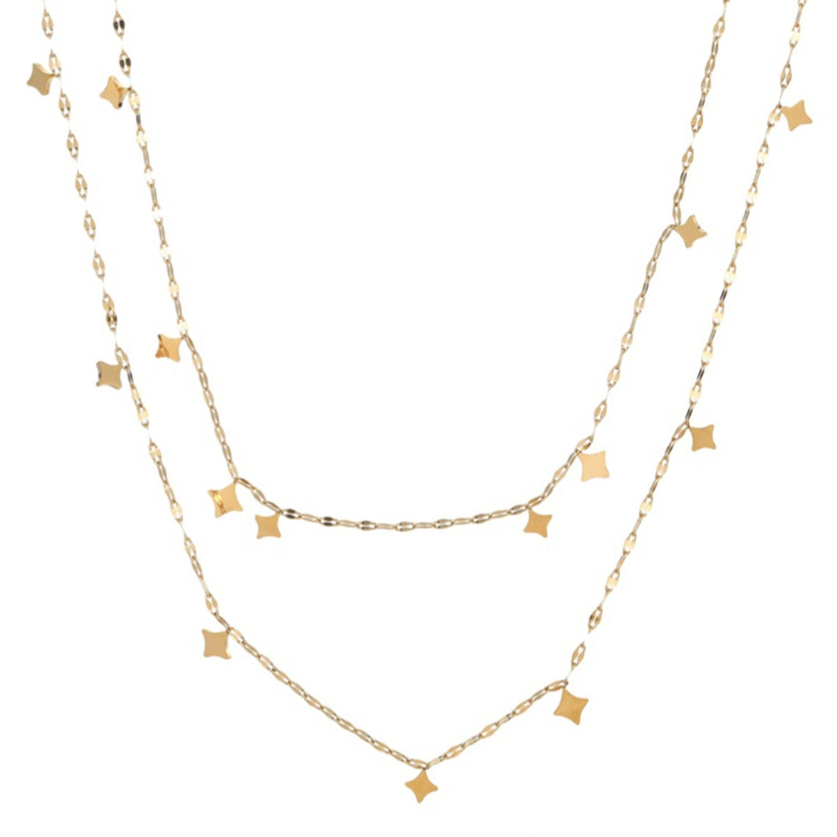 Layered gold tone necklace on white