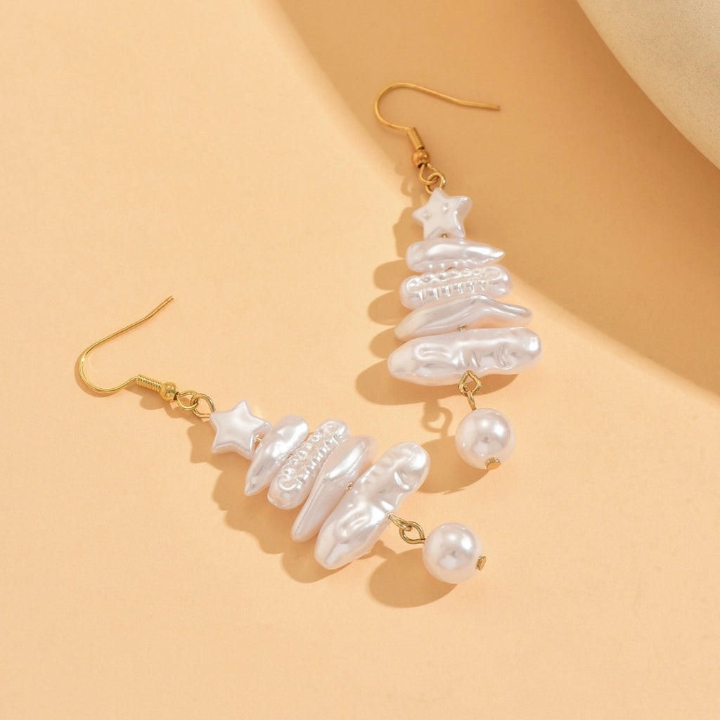 Christmas tree earrings made of stacked faux pearl beads with a star on top