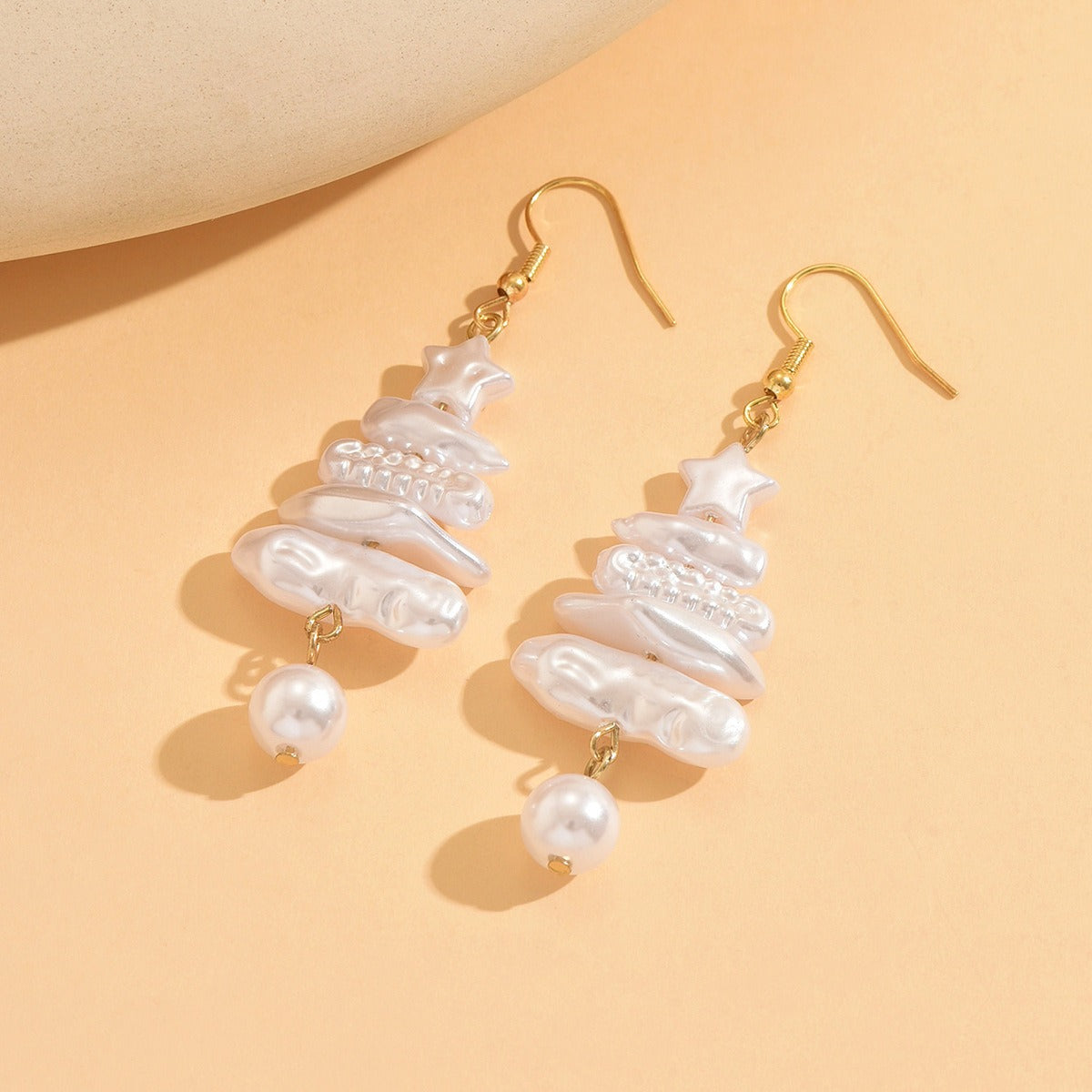 Christmas tree faux pearl earrings, side view