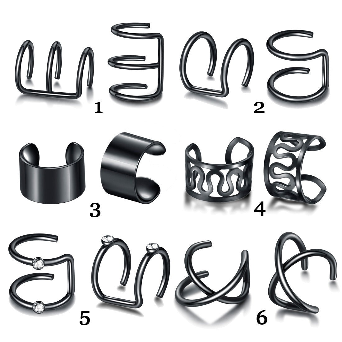Twelve black ear cuffs laid out in rows