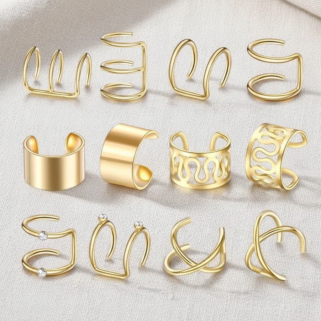 The ear cuffs laid flat on ivory linen