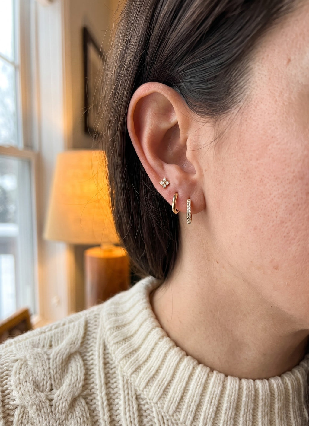 Huggie Earring Set in gold tone, worn in one ear